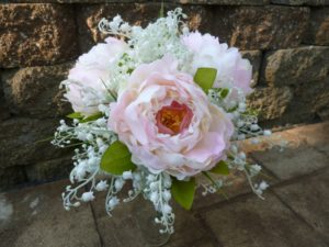 Peonies with lilies of the valley bouquet