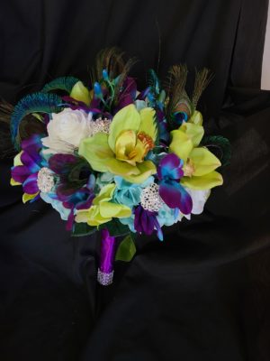 Galaxy and green cymbidium orchid, rose bridal bouquet with peacock feathers