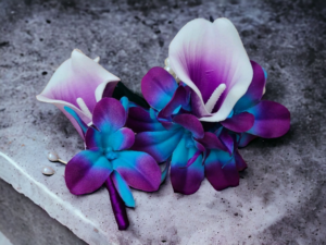 Galaxy orchid and calla lily wrist corsage and boutonniere set