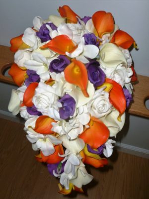 Orange and plum cascading bridal bouquet - Image 4