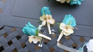 Turquoise rose and hydrangea boutonniere