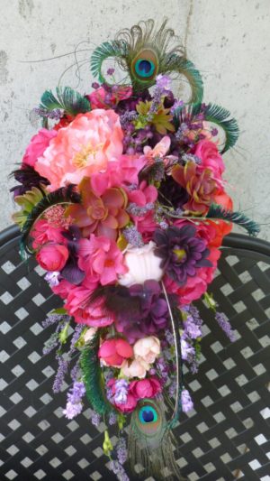 Pink, coral, sangria, plum purple cascading bouquet, peacock feathers, bridal teardrop bouquet