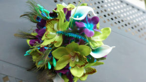 Green orchid, teal picasso calla and galaxy orchid bridal bouquet with peacock - Image 4