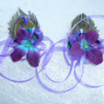 Galaxy orchid peacock feather wrist corsage with ribbon ties