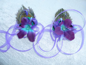 Galaxy orchid peacock feather wrist corsage with ribbon ties