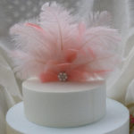 Ostrich feather blush pink cake topper