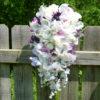 Cascading, calla, tulip, lilac, orchid bridal bouquet with baby's breath, roses - Image 2