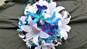Blue orchid and white cassablanca lily bouquet