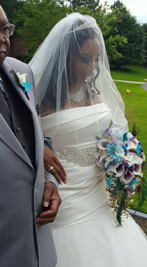 Cascading bridal bouquet with peacock feathers - Image 3