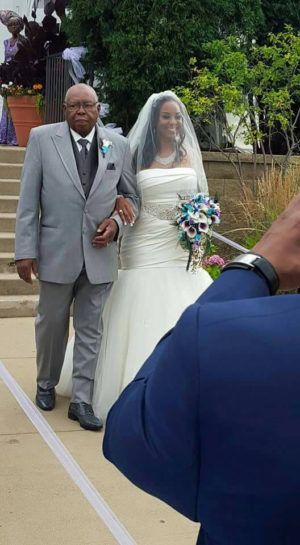Cascading bridal bouquet with peacock feathers - Image 2