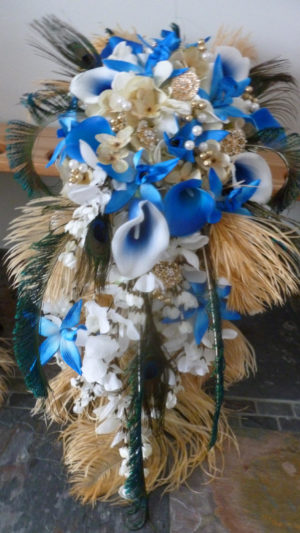 Cascading bridal bouquet with royal blue, gold, champagne flowers, feathers - Image 2