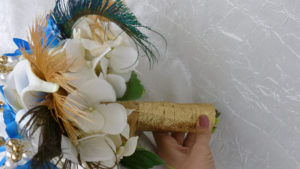 Cascading bridal bouquet with royal blue, gold, champagne flowers, feathers - Image 4