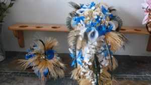 Cascading bridal bouquet with royal blue, gold, champagne flowers, feathers - Image 5