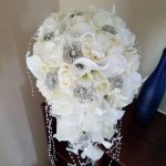 Ivory cascading bouquet callas, roses and pearls