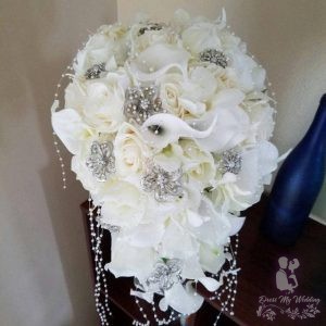 Ivory cascading bouquet callas, roses and pearls