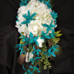 Teal orchid bridal bouquet with white roses and peacock feathers