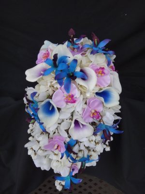 Cascading blue calla and orchid bouquet with lavender accent - Image 5