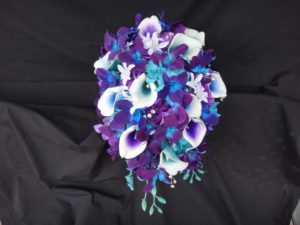 Galaxy orchid bridal bouquet with purple, teal and blue picasso callas