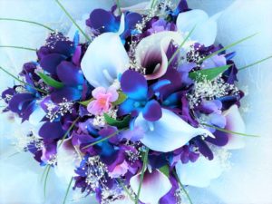 Galaxy orchid bridal bouquet with cherry blossoms