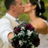 Plum purple bridal bouquet with peacock, berry, blueberry accent, pearl stems, baby's breath, fall bouquet, autumn wedding