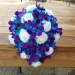 Galaxy orchid bridal bouquet with roses