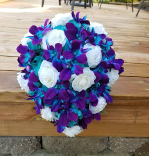 Galaxy orchid bridal bouquet with roses