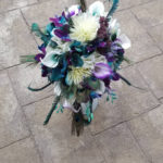 Purple, teal, peacock cascading bouquet