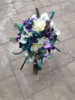Purple, teal, peacock cascading bouquet