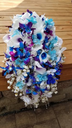 Cascading white hydrangea bouquet with blue orchids - Image 2