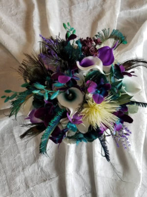 Purple, teal, peacock bridal bouquet