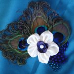Bridal ivory peacock feather hair piece, ivory purple satin flower accented with ivory freshwater pearl