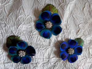 Peacock flower hair clip with rhinestone accent