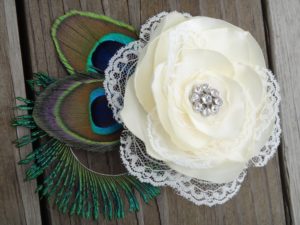 Bridal ivory satin lace flower hair clip accented with a rhinestone, peacock eye and sward feathers - Image 3