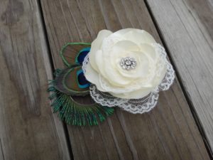 Bridal ivory satin lace flower hair clip accented with a rhinestone, peacock eye and sward feathers - Image 4