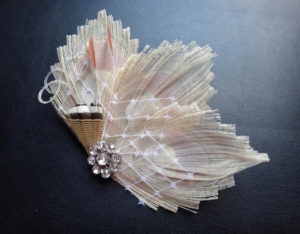 Bridal Ivory peacock hair piece with a rhinestone