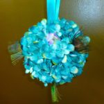 Teal hydrangea pomander, kissing ball with peacock feather accent
