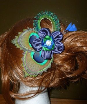 Satin flower peacock feather hair piece