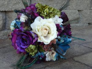 Teal and plum bouquet with peacock feathers - Image 2