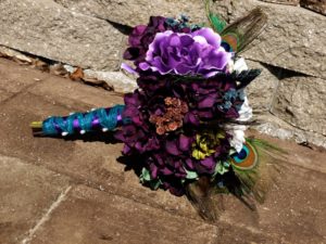 Teal and plum bouquet with peacock feathers - Image 6