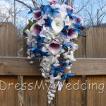 Cascading picasso calla and blue orchid bouquet