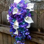 Purple-blue hydrangea cascading bouquet with orchids, calla lily, teal hydrangeas, purple teal bouquet