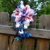 Cascading bouquet with tiger lilies and blue orchids