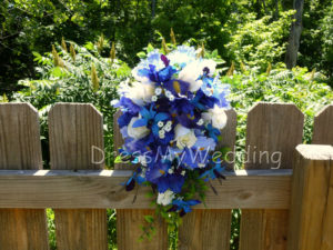 Cascading Iris and orchid bouquet with baby's breath - Image 3