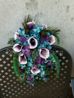 Teal and plum cascading bouquet with peacock feathers - Image 3