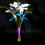 Calla lily bouquet with galaxy orchids and peacock feathers