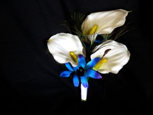 Calla lily and orchid bouquet with peacock feathers - Image 2