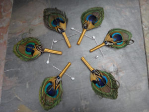 6 Peacock boutonnieres