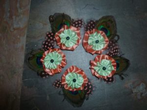 Coral mint flower hair clips,  peacock feathers,  freshwater pearls
