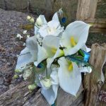 White calla lily, peacock, orchid bridal bouquet