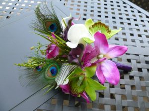 Cymbidium orchid and calla lily bouquet with peacock feathers - Image 2